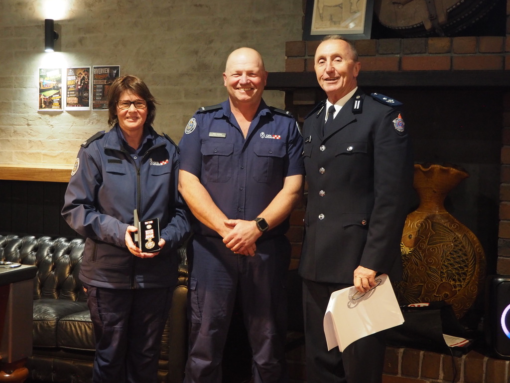 Tania Campbell first joined the Pound Creek Auxiliary in 2004, then after a stint as Auxiliary president, undertook training and became a firefighter in 2019. On Friday night she was presented with a 20-year service medal by Captain Mick Hughes and D